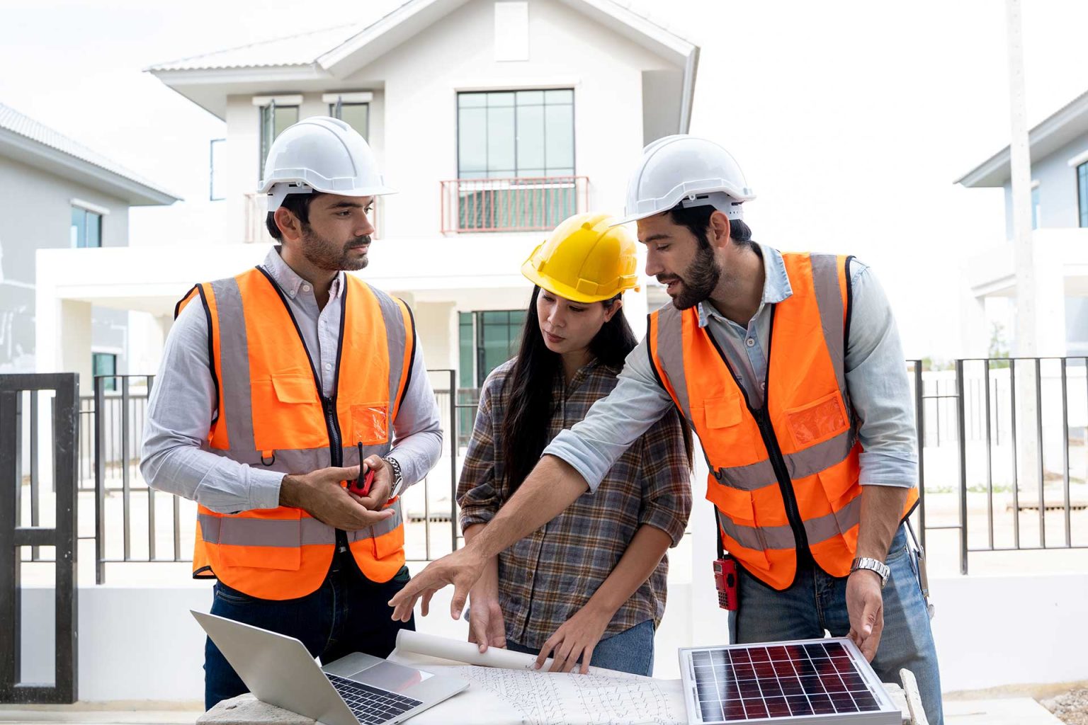 Construction team planning a new build project